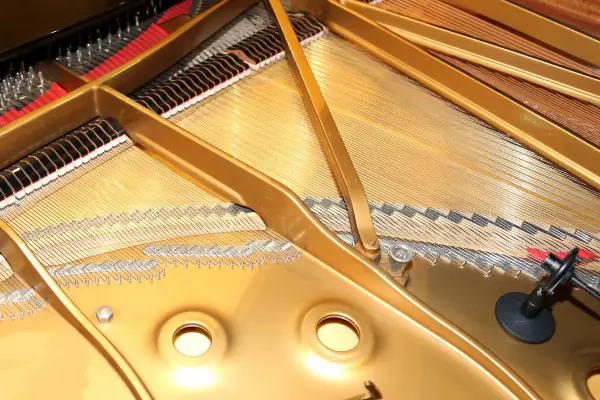 Microphone inside grand piano. Yamaha records the sound from multiple locations. 